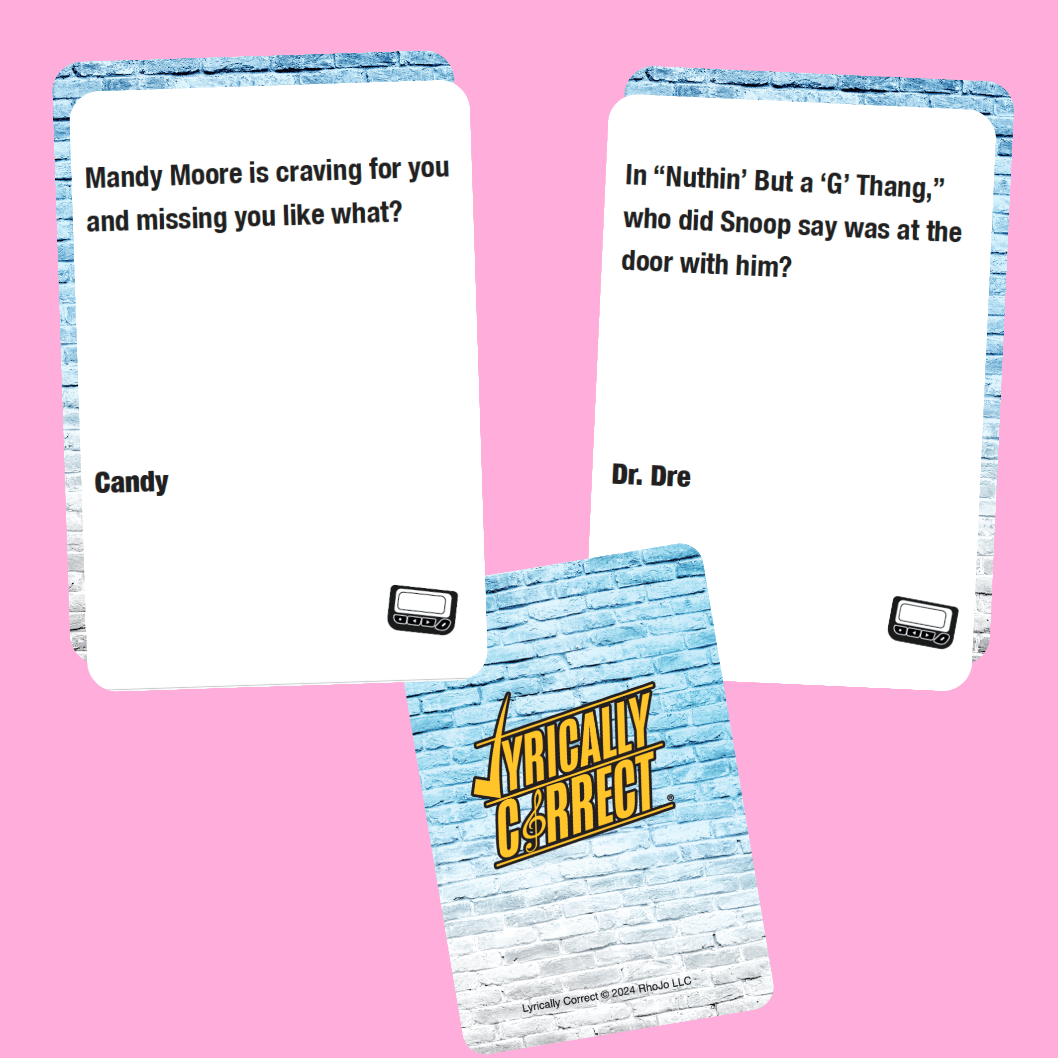Lyrically Correct card game showing trivia questions about song lyrics on white cards with blue brick background